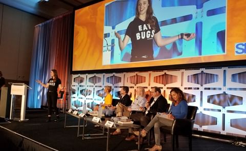 Impression of the SNAC Tank pitch competition at SNAXPO 2018 with 'Shark' Barbara Corcoran and Laura D'Asaro, co-founder of Chirps Chips during her winning presentation. Impression of the SNAC Tank pitch competition at SNAXPO 2018 with 'Shark' Barbara Corcoran and Laura D'Asaro, co-founder of Chirps Chips during her winning presentation.