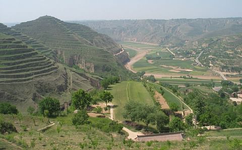 Hillsides are terraced in the Loess Plateau, Dryland Agricultural Research Station, Doupo Village, China. (Courtesy: Xianqing Hou).