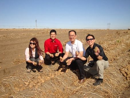 Southeast Asia buyers visiting an Idaho® potato field during a 2012 inbound trade mission  