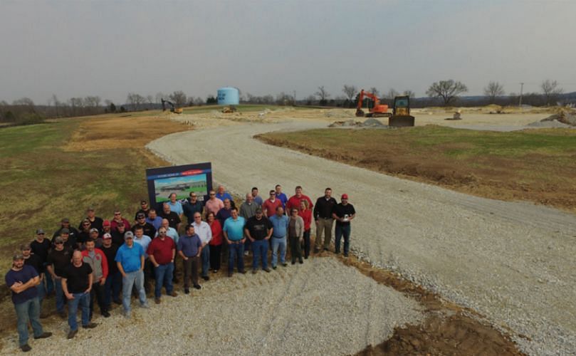 Spray Dynamics' team at the site of the new facilities 