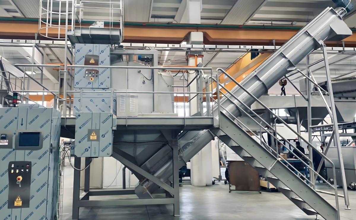 Overview of an FME steam peeling system installation, integrating the steam peeler, accumulator and discharge conveyors within a high-capacity potato processing line