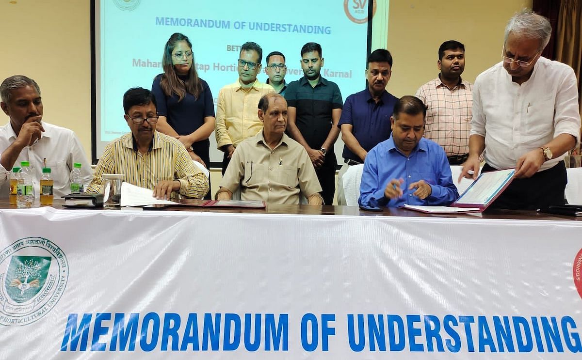 Signing the MoU organized in the conference hall of Maharana Pratap Horticulture University, Karnal, India