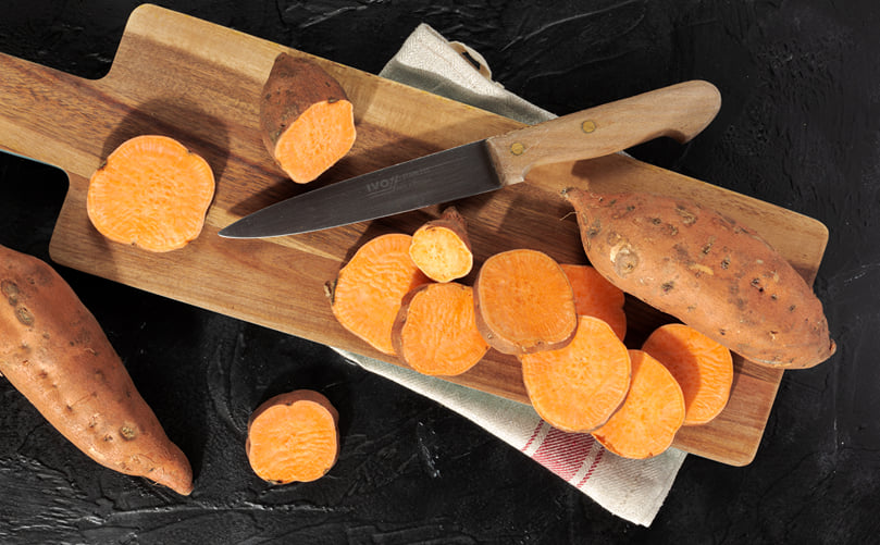 Sweet Potato Chips Showcasing Natural Color and Texture Sweet Potato Chips Showcasing Natural Color and Texture