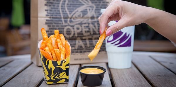 Boldly seasoned French Fries with a side of warm Nacho Cheese coming to Taco Bell: Nacho Fries