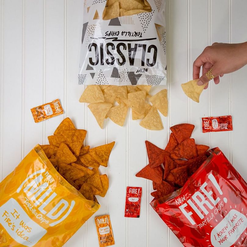 The Classic tortilla chips are salted and crispy, the perfect sidekick for your dip of choice. The Mild tortilla chips are seasoned with the bold flavor of Taco Bell’s Mild sauce, including hints of three chili peppers and cumin. The Fire tortilla chips convey the fiery flavor of Taco Bell’s Fire sauce, with hints of jalapeño, chili peppers and paprika. The Classic tortilla chips are salted and crispy, the perfect sidekick for your dip of choice. The Mild tortilla chips are seasoned with the bold flavor of Taco Bell’s Mild sauce, including hints of three chili peppers and cumin. The Fire tortilla chips convey the fiery flavor of Taco Bell’s Fire sauce, with hints of jalapeño, chili peppers and paprika.