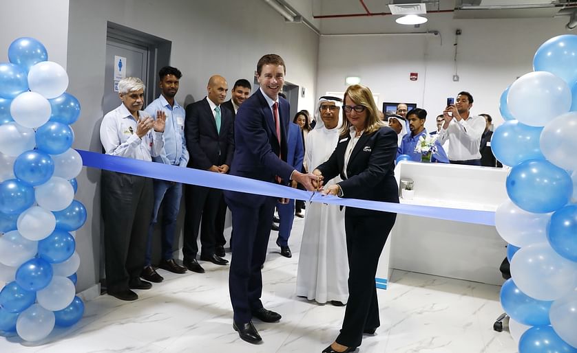 Mr. Ian Halliday, Australian Consul General to Dubai (left) and Nadia Taylor, tna director and co-founder (right) performing the ribbon cutting to inaugurate the new tna facility in Dubai.