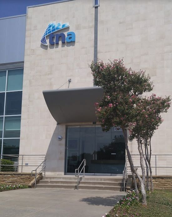 Main entrance of the tna North America facility in Dallas, Texas