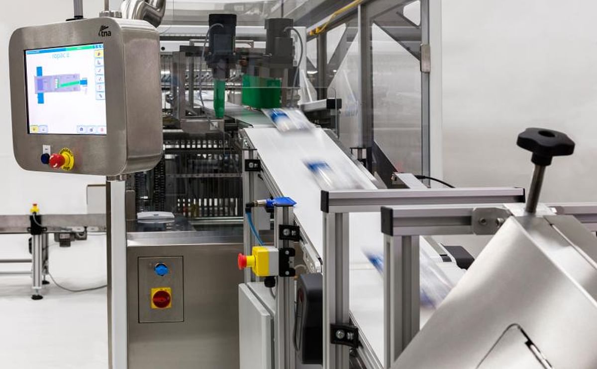 Contrary to the majority of case packers that employ vacuum pick and drop technology, the new tna ropac 5 is based on tna’s proprietary revolutionary, semi-rotary bag stacking motion, allowing snack food manufacturers unprecedented levels of throughput