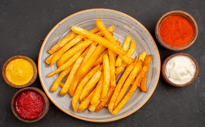 Golden Perfection: Crispy French Fries Fresh from the Fryer