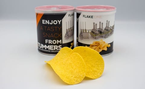Stackable potato chips displayed with processing visuals from Tummers Food Processing Solutions, highlighting how potato remnants can be transformed into uniform, stackable chips through a sustainable flake-to-dough production process. Stackable potato chips displayed with processing visuals from Tummers Food Processing Solutions, highlighting how potato remnants can be transformed into uniform, stackable chips through a sustainable flake-to-dough production process.