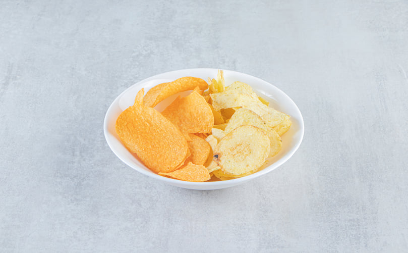 How Low-Fat Potato Chips Compare to Regular Chips How Low-Fat Potato Chips Compare to Regular Chips