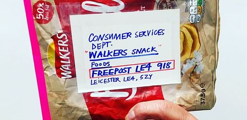 Empty chip bags mailed back to Walkers in protest against plastic packaging