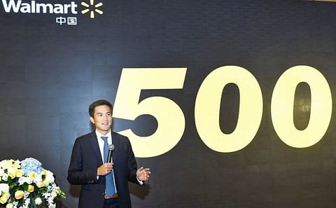 James Ku, senior vice-president of Realty, Walmart China, speaks in Shenzhen on the retailer's expansion plan in China. (Courtesy: China Daily)