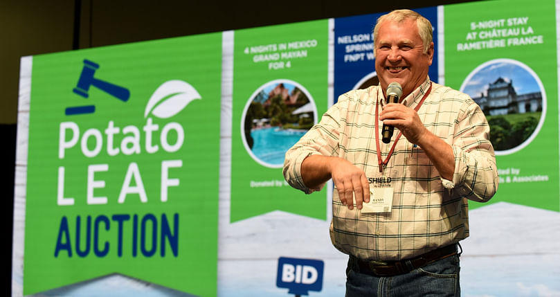 Washington potato grower and former NPC President Randy Mullen served as the auctioneer for the Potato LEAF live auction, held on the Expo Stage. Courtesy: Potato Expo and Bill Schaefer Photography