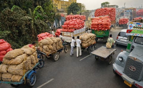Vehicles carrying agricultural produce outside a cold storage in Singur, West Bengal Vehicles carrying agricultural produce outside a cold storage in Singur, West Bengal