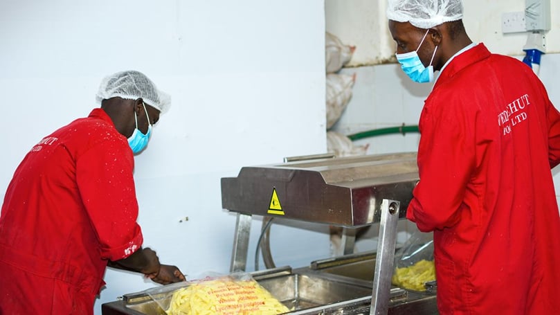 Workers package potatoes at Wedgehut Company in Ruiru. Courtesy: POOL Workers package potatoes at Wedgehut Company in Ruiru. Courtesy: POOL