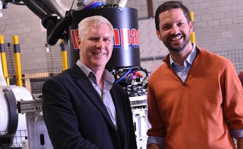 Andrew Barclay, Managing Director, Wyma Solutions (left), and Daniel Mueller, President and CEO, Volm Companies (right), shake hands at the newly opened Volm Companies Center of Excellence for Material Handling and Robotic Palletizing in Ancaster, Ontario Andrew Barclay, Managing Director, Wyma Solutions (left), and Daniel Mueller, President and CEO, Volm Companies (right), shake hands at the newly opened Volm Companies Center of Excellence for Material Handling and Robotic Palletizing in Ancaster, Ontario